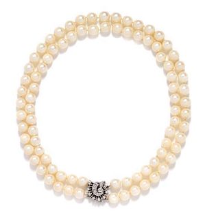A 14 Karat White Gold and Diamond Double Strand Cultured Pearl Necklace,