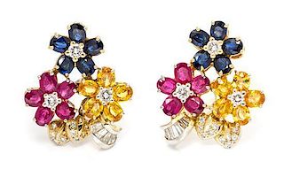 A Pair of Yellow Gold, Sapphire, Ruby and Diamond Floral Motif Earclips, 14.90 dwts.