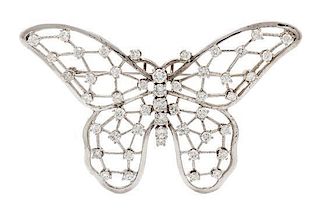 A White Gold and Diamond Butterfly Pendant/Brooch, 7.30 dwts.