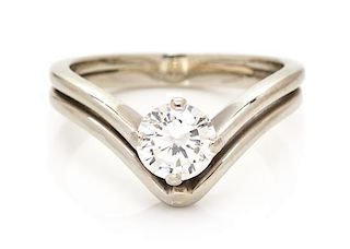 An 18 Karat White Gold and Diamond Ring, 2.40 dwts.