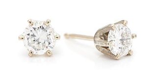 A Pair of White Gold and Diamond Studs, 0.70 dwts