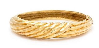 An 18 Karat Yellow Gold Bangle Bracelet, 25.00 dwts.