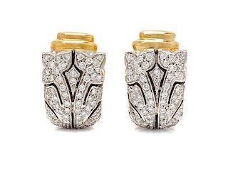 * A Pair of 18 Karat Bicolor Gold and Diamond Earclips, 9.20 dwts.