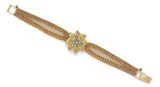 A 14 Karat Yellow Gold and Opal Surprise Wristwatch, 18.40 dwts.