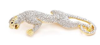 An 18 Karat Yellow Gold, Diamond and Sapphire Panther Brooch, 12.20 dwts.