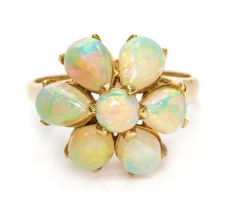 * A 14 Karat Yellow Gold and Opal Ring, 2.50 dwts.