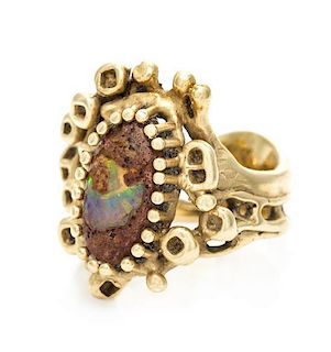 A 14 Karat Yellow Gold and Opal Ring, 8.90 dwts.