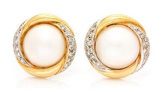 A Pair of Yellow Gold, Mabe Pearl and Diamond Earclips, 24.50 dwts.