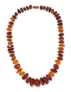 A Graduated Amber Bead Necklace, 100.60 dwts.