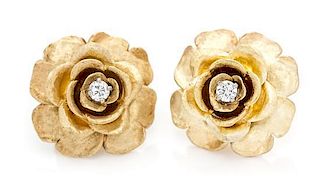 A Pair of 14 Karat Yellow Gold and Diamond Floral Motif Earclips, 9.40 dwts.