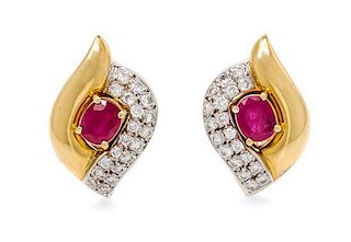 * A Pair of 18 Karat Bicolor Gold, Ruby and Diamond Earclips, Hauer, 10.90 dwts.
