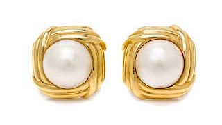 * A Pair of 18 Karat Yellow Gold and Mabe Pearl Earclips, 13.30 dwts.