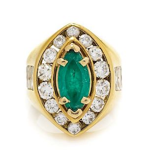 * An 18 Karat Yellow Gold, Emerald and Diamond Ring, 11.30 dwts.