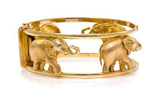 An 18 Karat Yellow Gold Elephant Motif Bangle Bracelet, 34.90 dwts.