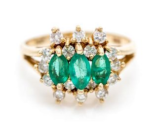 A 14 Karat Yellow Gold, Emerald and Diamond Ring, 2.10 dwts.