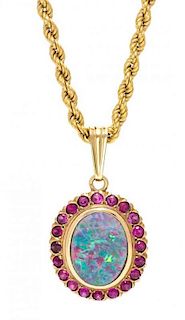 A Yellow Gold, Opal Doublet and Ruby Pendant, 8.50 dwts.