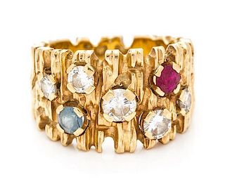 A Yellow Gold, Diamond and Multi Gem Band, 7.40 dwts.
