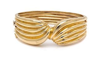 A 14 Karat Yellow Gold Bangle Bracelet, 30.30 dwts.