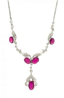 * A Collection of White Gold, Ruby, and Diamond Jewelry, 7.80 dwts.