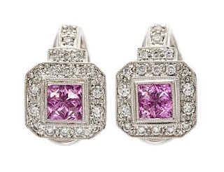 A Pair of Platinum, Pink Sapphire and Diamond Earclips, 8.90 dwts.