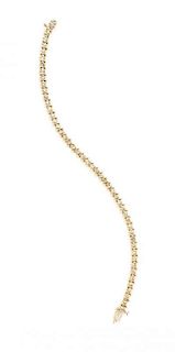 A 14 Karat Yellow Gold and Diamond Line Bracelet, 6.60 dwts.
