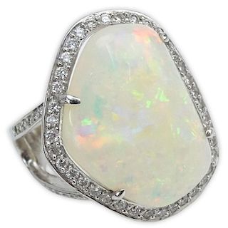 Large White Opal, Round Brilliant Cut Diamond, Blue Diamond and 18 Karat White Gold Ring.