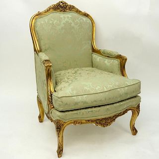 20th Century Wood Carved Gold Leaf Upholstered Bergere Chair.