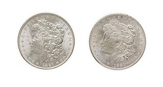 A Group of Two United States Morgan Silver Dollars