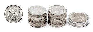 A Group of 23 United States Morgan Silver Dollars