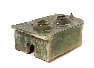 * A Chinese Dark Green Glazed Pottery Model of a Stove Length 9 x width 6 3/4 inches. 深綠釉陶爐，汉，長9 x寬6.75英吋