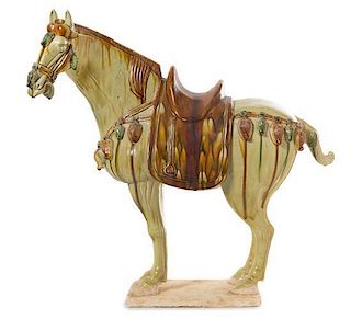 * A Large Sancai Glazed Pottery Figure of a Horse Height 24 3/4 inches. 三彩馬立像，仿唐，高24.75英吋