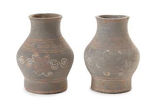 * A Pair of Painted Pottery Vessels Height of each 6 1/4 inches. 彩繪陶罐一對，或漢，均高6.25英吋