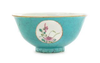 A Chinese Famille Rose Porcelain Footed Bowl Diameter 5 3/4 inches. 松石綠地粉彩開光花卉紋碗，清乾隆，口徑5.75英吋