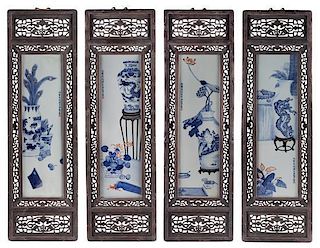 A Set of Four Blue and White Porcelain Plaques Height of each panel 28 3/4 x width 8 1/4 inches. 青花博古紋瓷板一組四件，高28.75x宽8.25