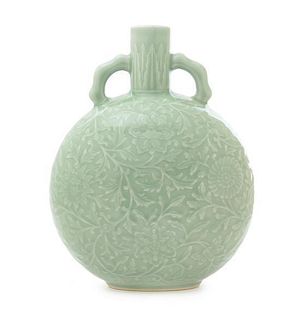 A Celadon Porcelain Moon Flask Height 10 1/2 inches. 青釉纏枝花卉紋抱月瓶，高10.5英吋