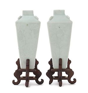 * A Pair of Celadon Glazed Porcelain Vases Height of each 6 1/4 inches. 淡青釉暗刻花卉紋四方瓶一對，高6.25英吋