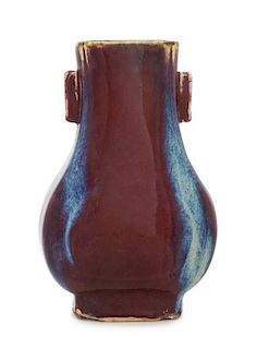 A Flambe Glazed Porcelain Vase Height 10 3/4 inches. 窯變釉雙貫耳方樽，高10.75英吋