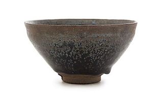 A Black Glazed 'Oil-Spot' Stoneware Tea Bowl Diameter 4 3/4 inches. 黑釉“油滴”茶碗，口徑4.75英吋