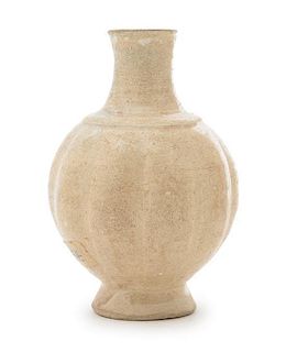 A Small White Glazed Stoneware Vase Height 4 1/2 inches. 白釉瓜形瓶，或宋元時期，高4.5英吋