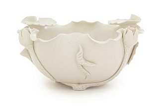 * A Blanc-de-Chine Porcelain Bowl Diameter 8 1/4 inches. 德化窯白釉蓮瓣碗，口徑8.25英吋