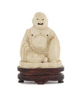 A White Glazed Porcelain Figure of Mile Buddha Height 3 3/4 inches. 白釉彌勒佛小坐像，高3.75英吋