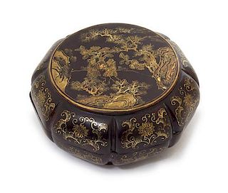 A Gilt Decorated Black Lacquer Box and Cover Diameter 5 1/2 inches. 黑漆描金人物圖蓋盒，直徑5.5英吋