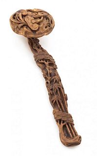 * A Carved Boxwood Ruyi Scepter Length 12 3/4 inches. 黄杨木雕靈芝竹紋如意，長12.75英吋