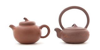 Two Yixing Pottery Teapots Height of taller 4 3/4 inches. 宜興紫砂壺兩件，最高4.75英吋