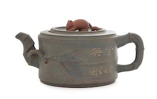 A Yixing Teapot Height 3 3/4 inches. 宜興紫砂壶，高3.75英吋