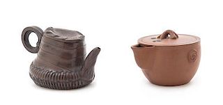 Two Yixing Pottery Teapots Height of taller 3 1/4 inches. 宜興紫砂壺兩件，最高3.25英吋