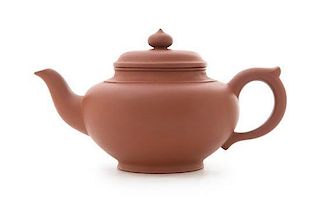 A Yixing Pottery Teapot Hieght 4 1/8 inches. 宜興紫砂壺，高4.125英吋，"楊曉泉制"款