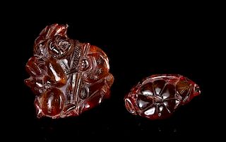 Two Amber Toggles Height of larger 2 inches. 琥珀雕擺件兩件，最長2英吋