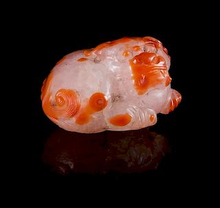 An Agate Figure of a Fu Lion Length 1 1/2 inches. 南紅佛獅把件，長1.5英吋