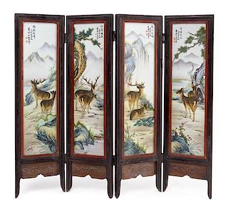 A Polychrome Enameled Porcelain Inset Four-Fold Table Screen Height of each panel 18 1/4 inches x width 4 1/2 inches. 粉彩山水梅花鹿圖桌屏